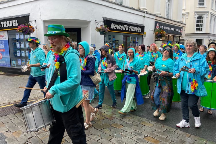 Crooked Tempo samba band at Tavistock Pride's procession.