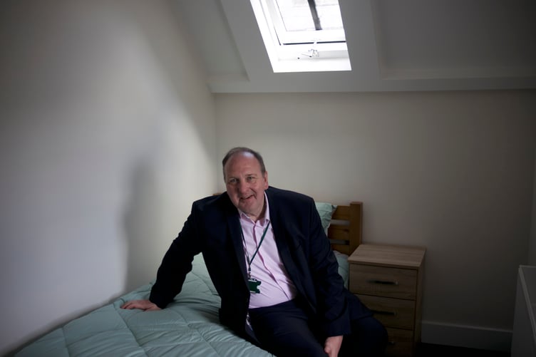 West Devon Borough Cllr Mark Renders unveils a new block of temporary accommodation to help ease the housing crisis. Picture by Jude Wright.