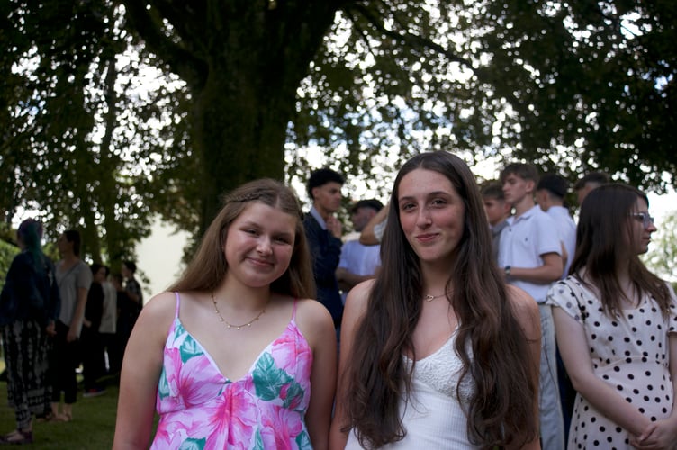 Friends Eleanor, of Tavistock, and Tamsyn of Tavistock,, celebrate the end of GCSEs at Tavistock College graduation ceremony in St Eustachius' Church in Tavistock. Picture by Jude Wright.