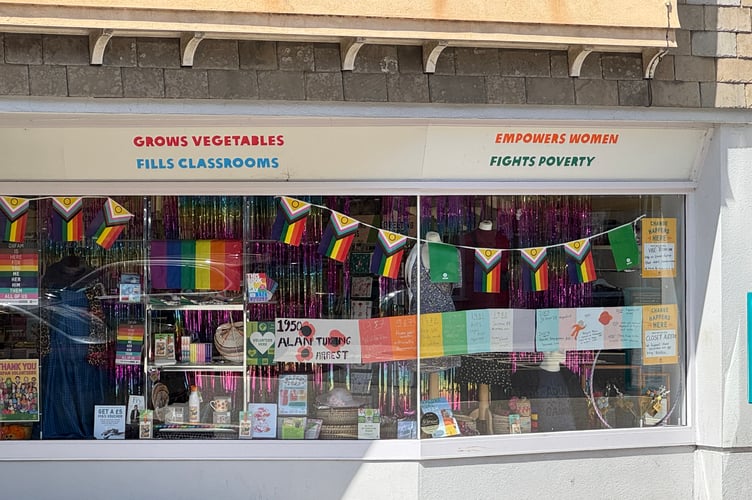 The Oxfam Shop window decorated for Okehampton Pride. AQ 6469