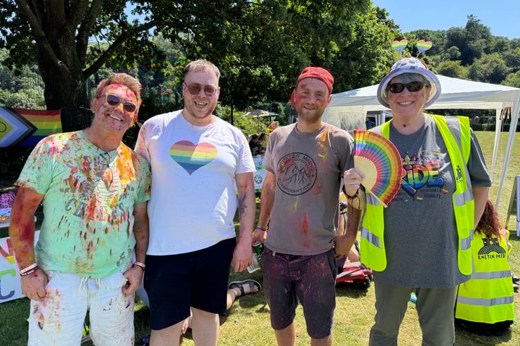 Colour cricket participants, left and third left, with Okehampton Pride organisers Daniel Burgess, second left and Jessica Greaves, right. AQ 6559