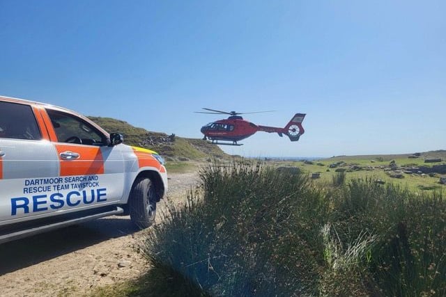 Tavistock Dartmoor Rescue Team Tavistock work with Devon Ambulance to help one of two walkers yesterday (Saturday).