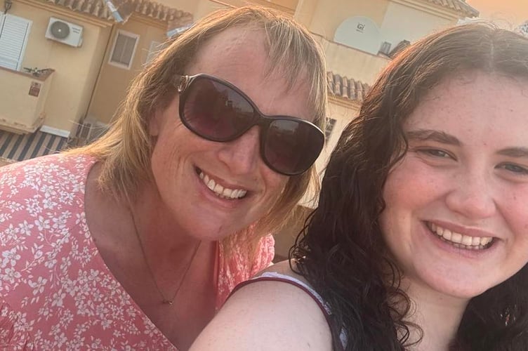 Katie Hollis, right, reunited with mum Jami Harris.