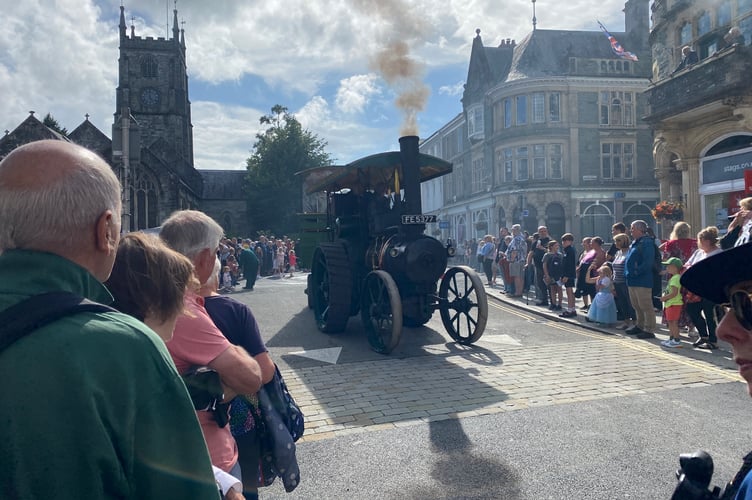 A Robey Trust steam engine adds to the atmosphere at Tavistock Carnival.