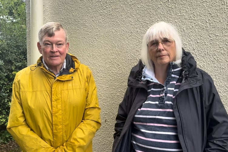 Cllr Robert Oxborough and Churchwarden Helen Harris outside the toilet block.