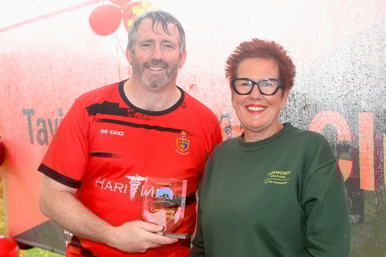 Tavistock's Mark Darby, Juniors Club Chairman being presented with their award by Samworth Brother's South West community coordinator Sarah Perkins. (Picture: Samworth Brothers)