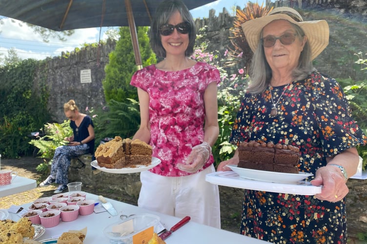 Staff Fran Xx and Carol Tor at Drake Lodge shared accommodation in Tavistock,  where they served cakes made by residents, families, volunteers and staff at the home's summer fair.