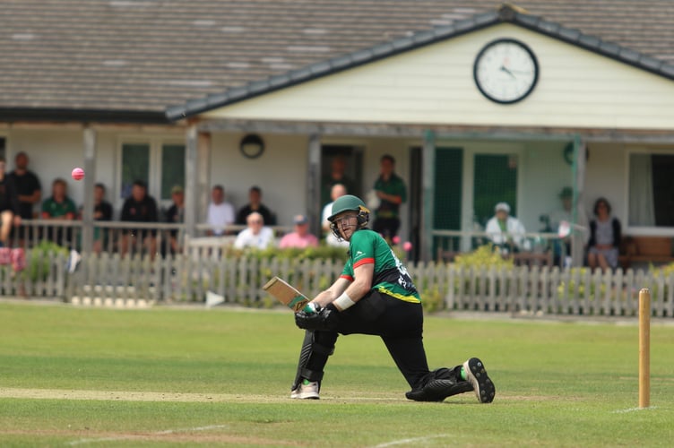 Hatherleigh's Ryan Davies on the way to a century in the win over Kilmington