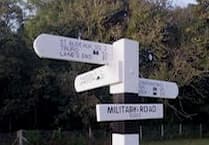 Handmade road sign taken down