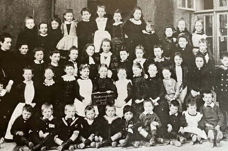 Stern looking pupils from Lady Modiford's School in a bygone time.