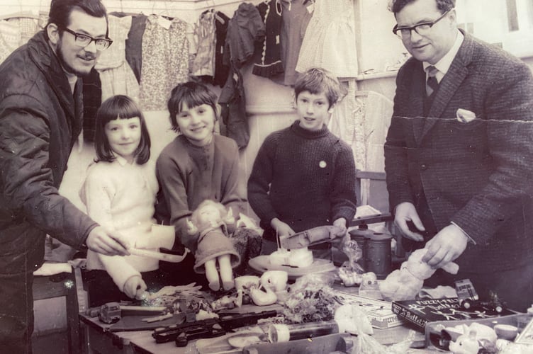 Lady Modiford's School in years gone by with a former teacher and pupils.