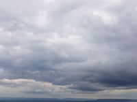 Overcast skies, light chance of rain, sun tomorrow