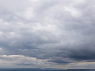 Overcast skies, light chance of rain, sun tomorrow