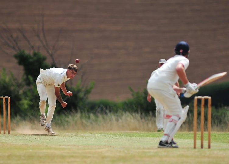 Devon Cricket League E Division West. Stokeinteignhead 1st XI versus Whitchurch Wayfarers 1st XI. Whitchurch bowler Nathan Prout sens a ball down to Oliver Hastie