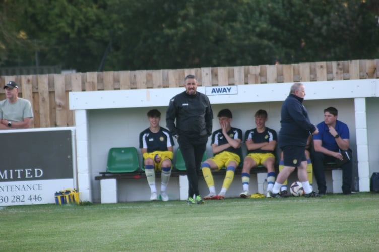 Okehampton Argyle manager Richard Washburn on the touchline