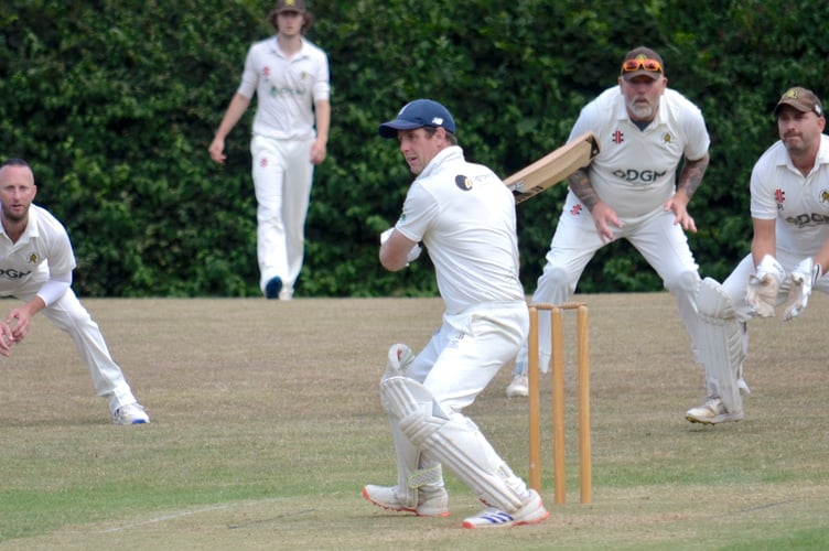 Abbotskerswell's close fielders have Bridestowe & Belstone captain Andrew Brimacombe in their sights. He soon obliged them by offering a catch to Aron Owen (far left)