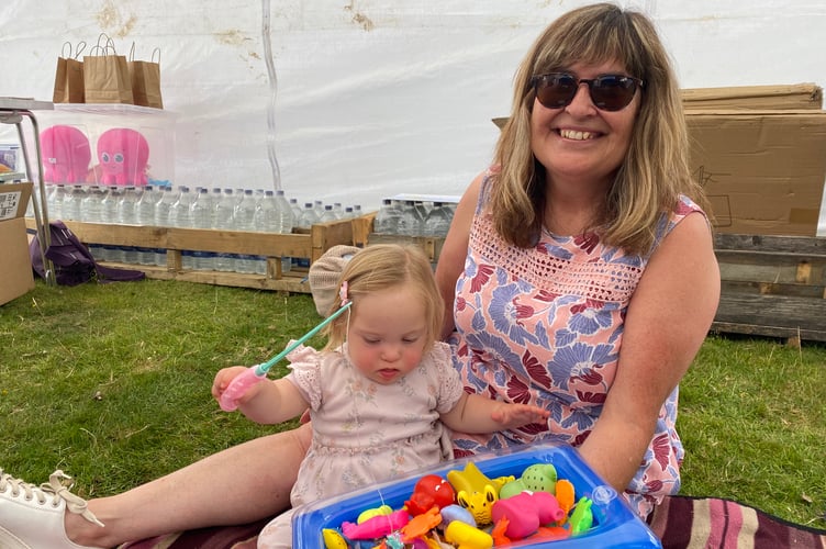 Lucia Clayton, 16 months, with her grandmother Nicola Price, of Plymouth, in the play tent at Yelverton Fun Day.