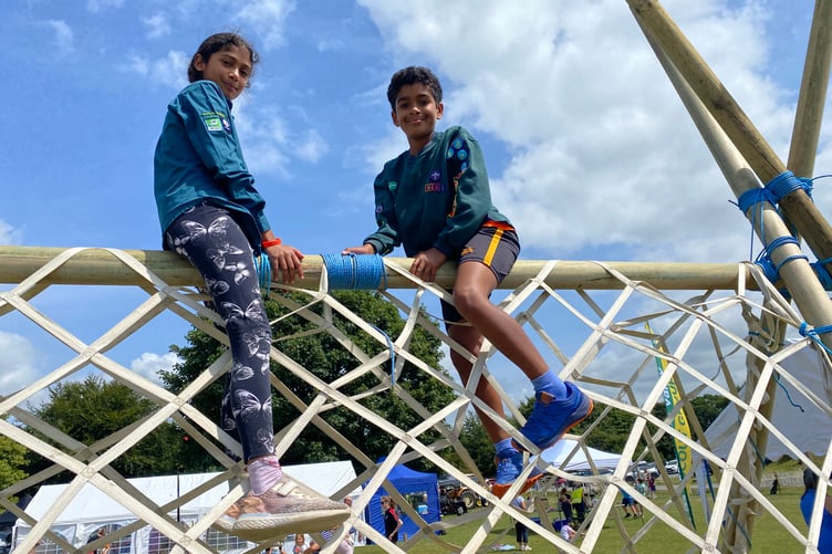 Scaling the heights at Yelverton Fun Day are Alyssa, 11, and brother Ethan, 9. The climbing structure was built by Walkham Valley and Horrabridge Scouts, of which they are members.