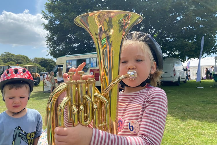 Hitting the right notes at Yelverton Fun Day by Amelia, 6, from Callington. Amelia was being shown the basics of the baritone horn by Alison Webster, of Tavistock Stannary Brass Band.