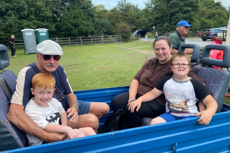 A highlight of Yelverton Fun Day was the chance to have a ride in a tractor trailer. The rides were provided by Okehampton Vintage Tractors.