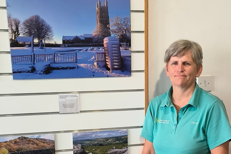 Claire Partridge with her Dartmoor National Park Calendar exhibit photo for the December page.