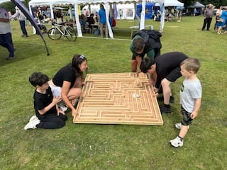 Puzzling over the maze at Yelverton Fun Day. Picture by Nigel Tigwell.