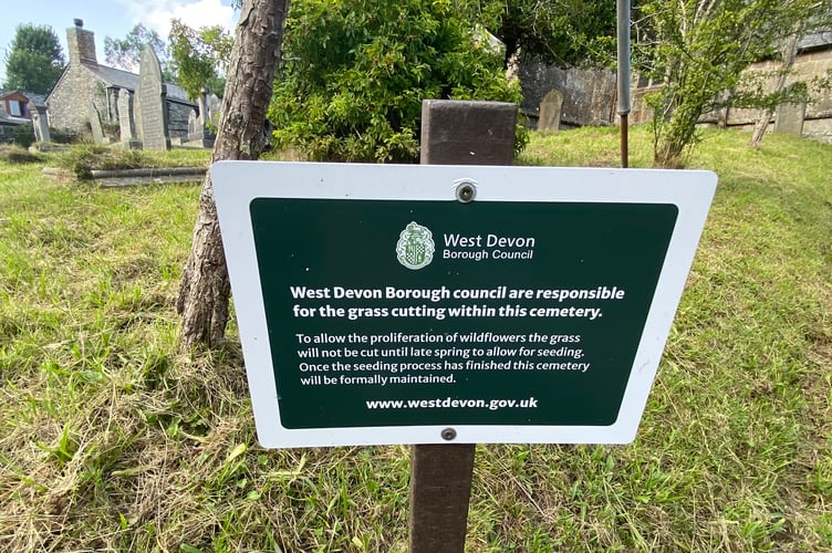 A sign in Mary Tavy churchyard.