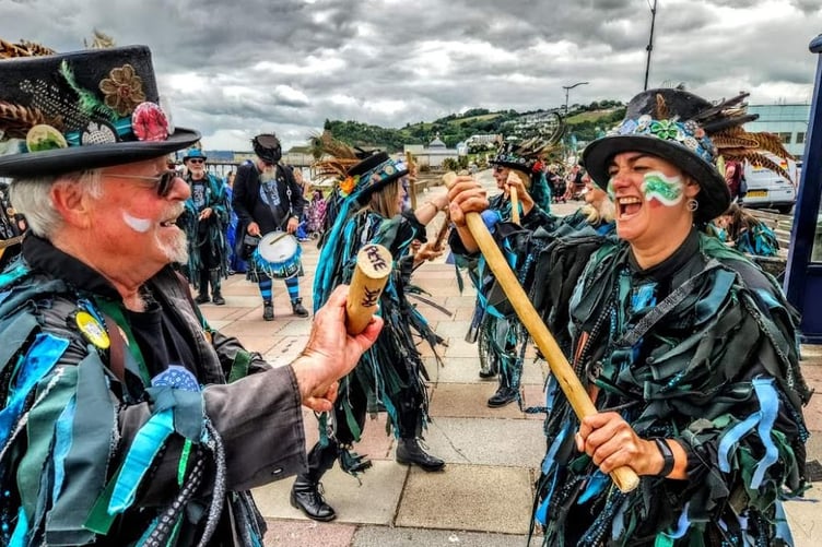 Lodestone Border Morris perform at the seaside.