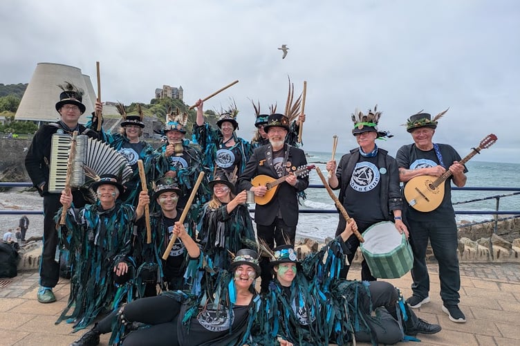 Lodestone Border Morris perform by the sea.