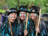Morris dancers shaking bells to mark 20 years 