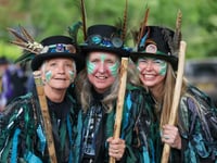 Morris dancers shaking bells to mark 20 years 