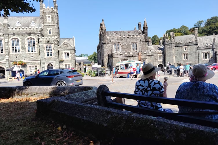 Enjoying an ice cream during a heatwave in Tavistock overlooking Bedford Square.