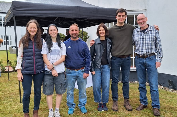 Standout students Alice Hunkin and Sebastian Crooke, who both got 4 A*s, with their families.