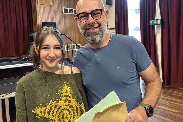 Bea Bradford with proud dad Dan, after she opened her results at Tavistock College.