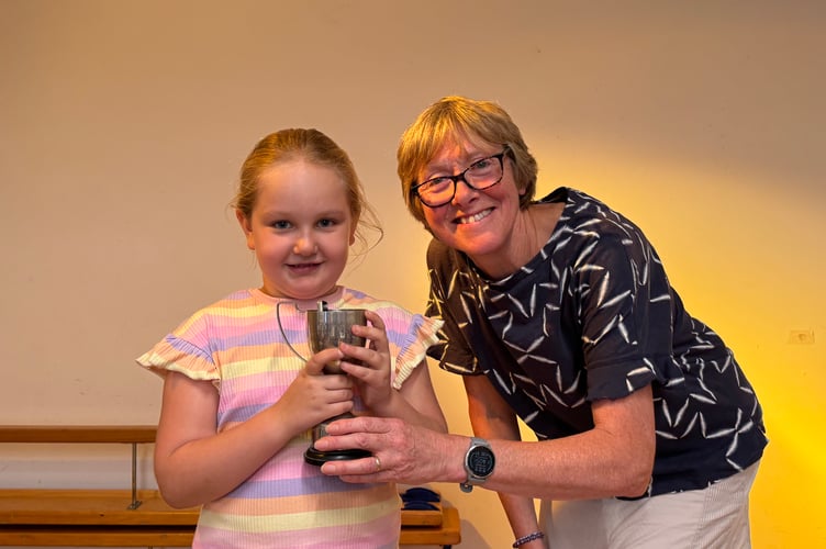 Molly won the Children’s Cup at Spreyton Show, presented by Show Secretary Sharon Hawking. AQ 0412