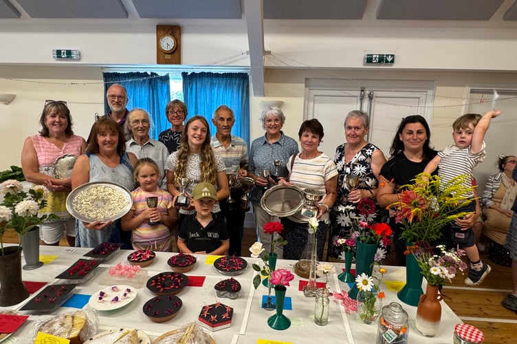 Trophy winners at Spreyton Flower, Produce and Crafts Show with Chairman Tony Talbot, fourth left, and Secretary, Sharon Hawking.  AQ 0454
