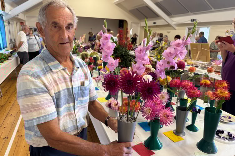 Cleave Collins won a prize for the Top Vase of two varieties of dahlias at Spreyton Show. AQ 0376