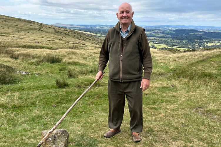 Courtney Heard from Meldon Farm Okehampton beating the Sourton parish boundary stone of Okehampton Hamlets.