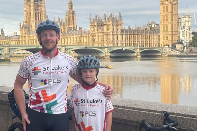 Luke and James Clement at the start of their cycle ride, in central London.