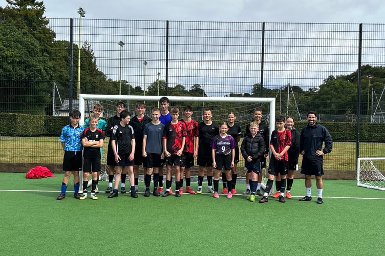 Coach Aaron Cusack and Tavistock youngsters