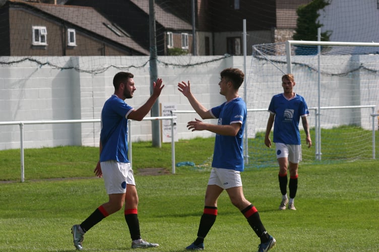 Toby Pullman (left) celebrates scoring Spurs' second of the afternoon