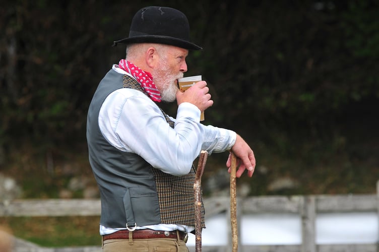 Widecombe Fair A little liquid libation for Bill Brewer of Uncle Tom's entourage