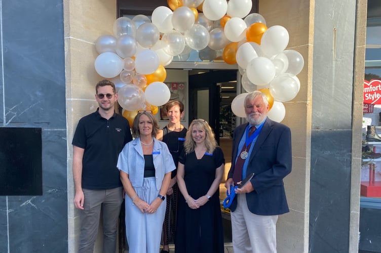 Town Mayor Cllr Steve Hipsey opens a newly expanded and relocated shoe shop Eskis.