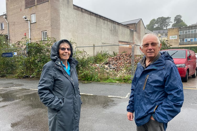 Stephen and Lesley Evans say the former Woolies demolition site between Market Road (pictured) and Brook Street is an eyesore.