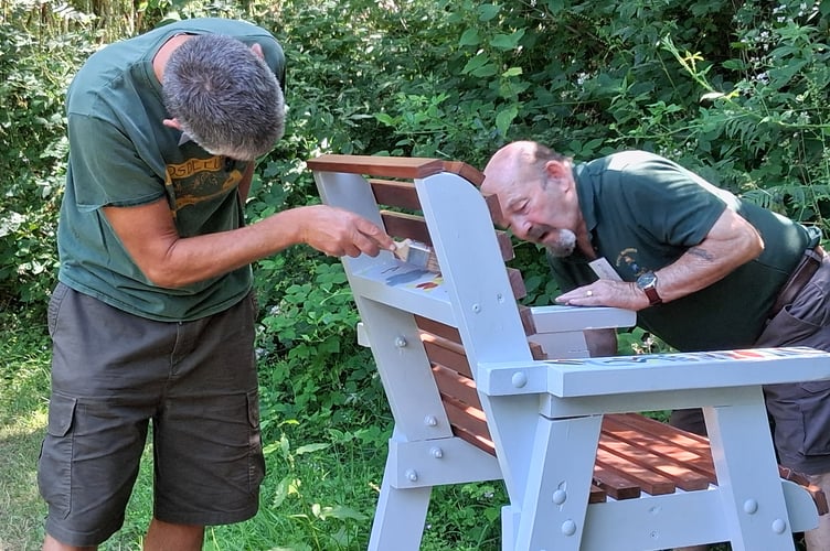 Richard and Graham Coiley (Tavistock Memory Cafe chair) joining in sharing skills and life experience on an outdoor event to share memories. Picture by Heather Rayne.