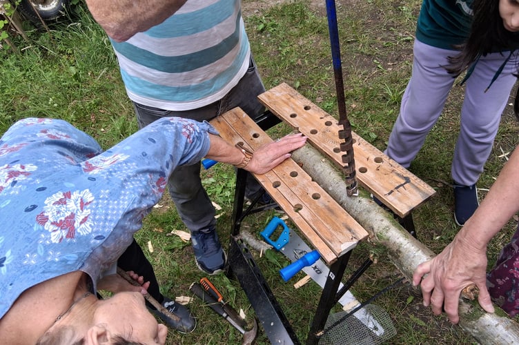 Tavistock memory and Tavistock youth cafes join forces in the woods to enjoy crafting and woodworking to help understand each other's experiences.