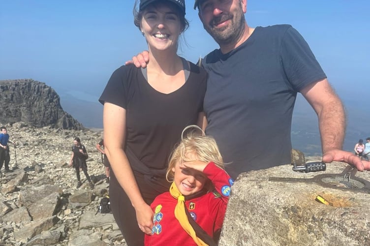 Intrepid Scout Squirrel Fletcher has climbed the highest mountain in the UK at the impressive age of only five. He is pictured with his parents