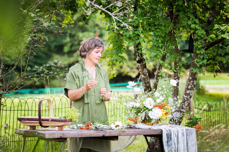 Joanna Game, a floral artist, creates arrangements that capture the fleeting life stages of flowers. Photo: Suzy Bennett
