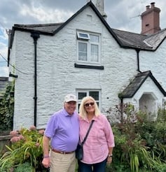 US visitors XX and wife XX Haaga visit Tavistock's historic Bedford Cottages where XX was brought up..