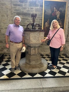 US visitors XX and wife XX Haaga visit Tavistock's St Eustachius' Church where XX was baptised.
